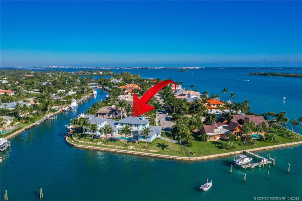 25 Island Road Stuart, FL 34996 - Photo 7 of 24 a view of a house with a big yard