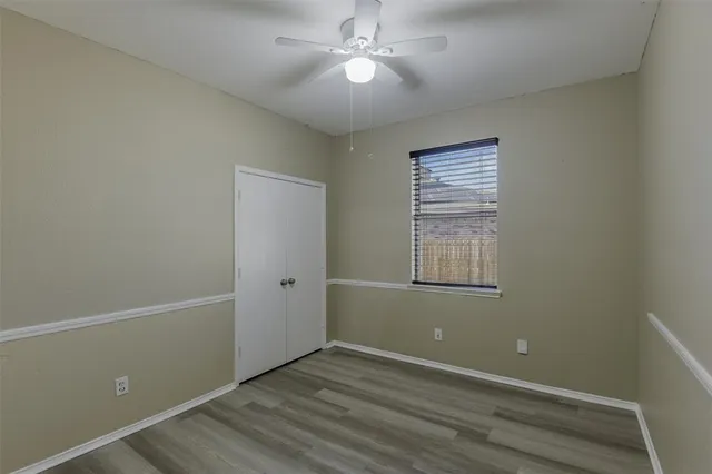 an empty room with a empty space and a window