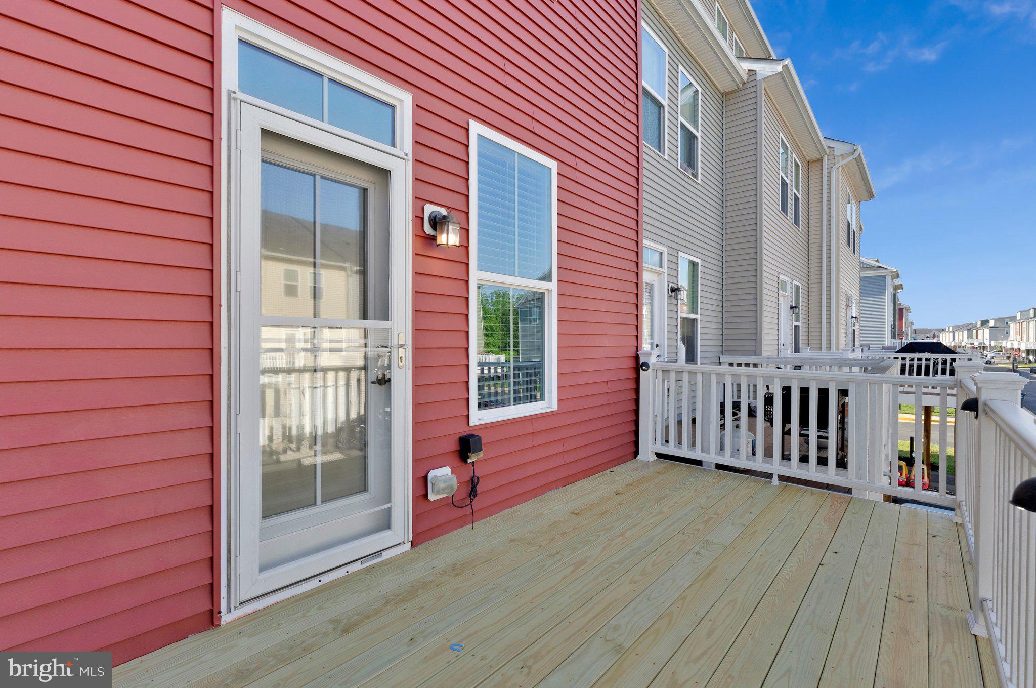 24977 Coats Square Aldie, VA 20105 - Photo 16 of 32 front view of a house with deck