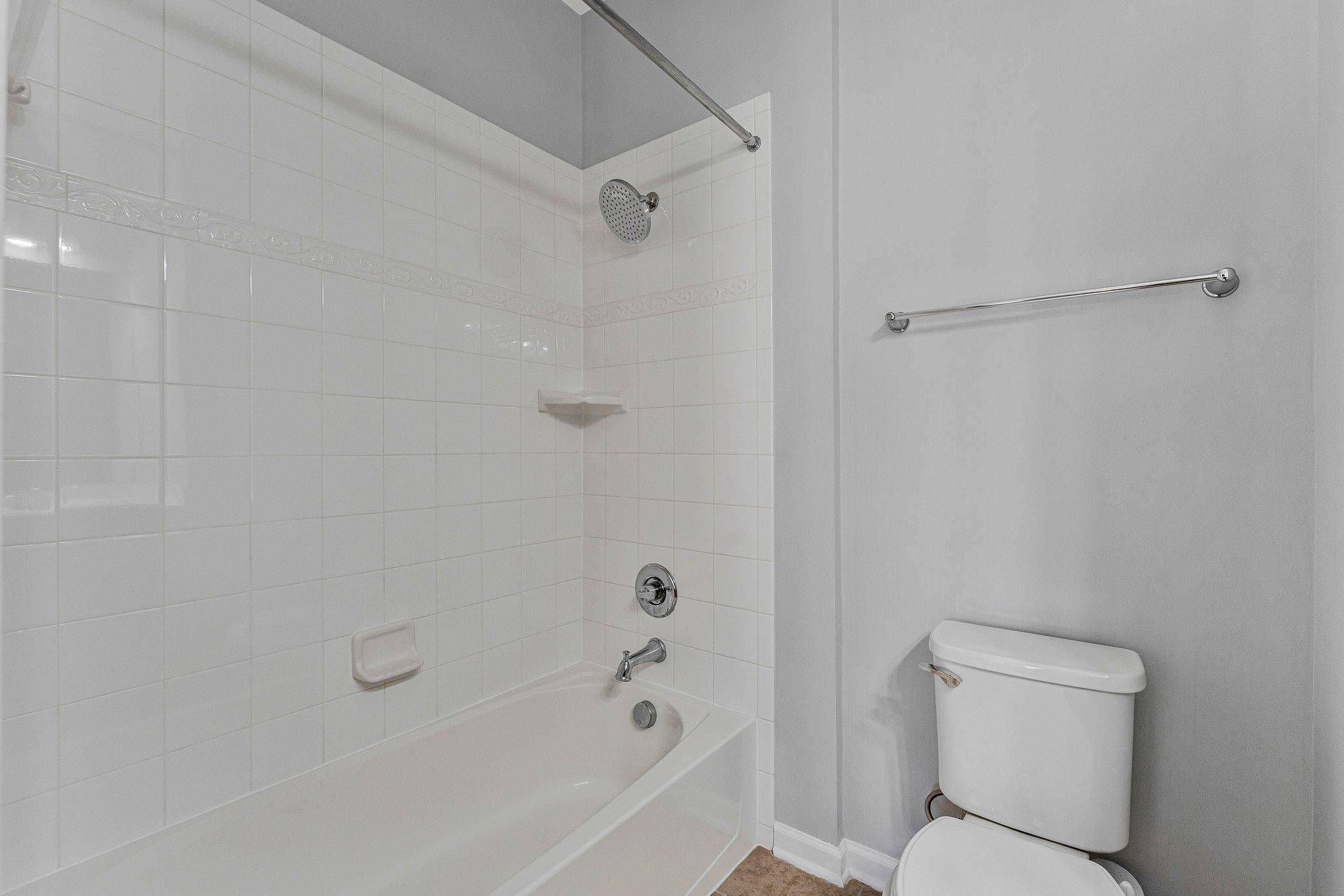 24977 Coats Square Aldie, VA 20105 - Photo 25 of 32 a bathroom with a toilet and shower