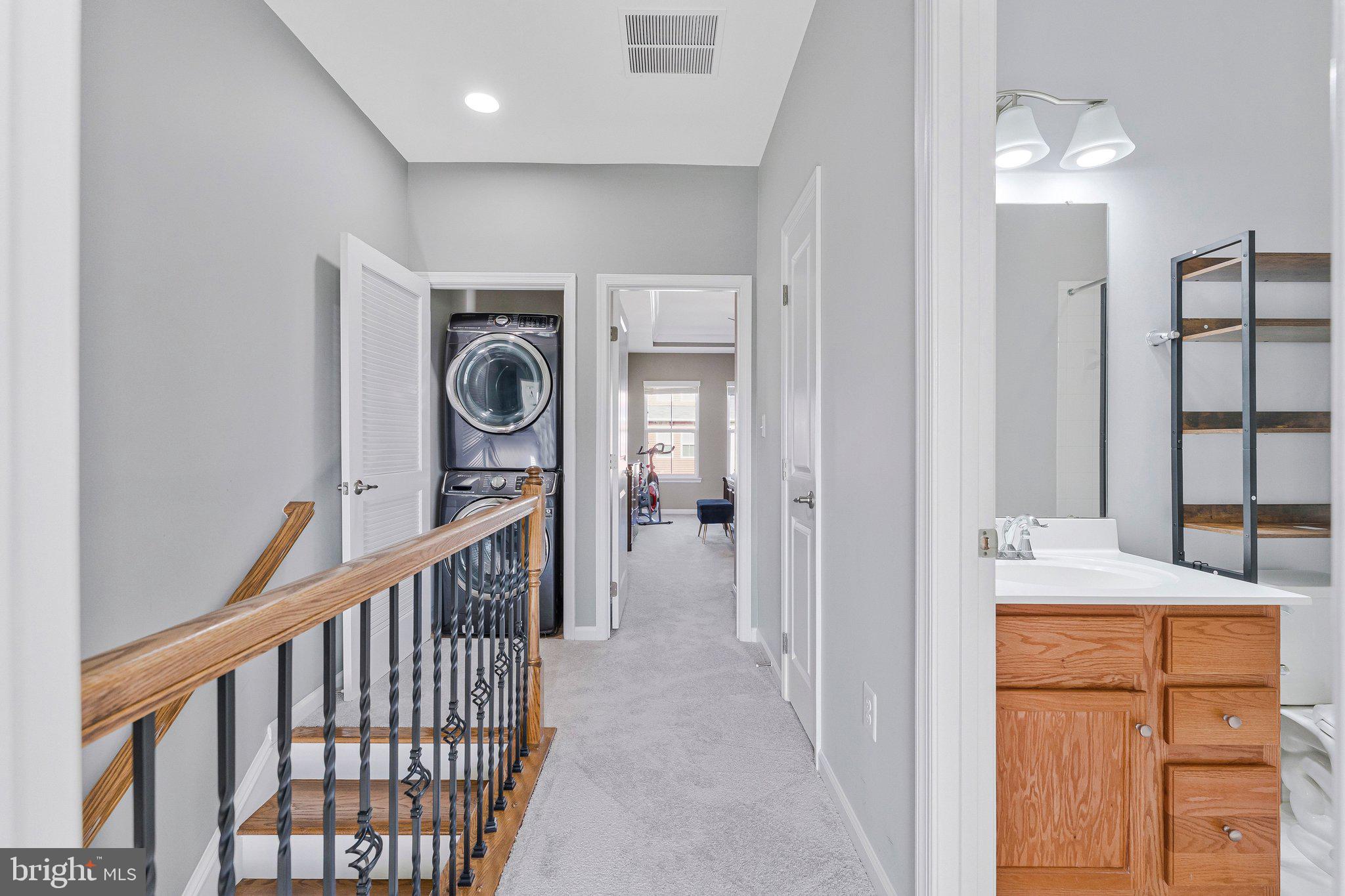 24977 Coats Square Aldie, VA 20105 - Photo 26 of 32 a view of a hallway and a livingroom with furniture