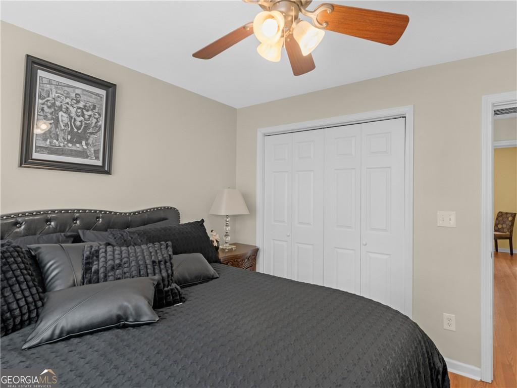 355 Parker Road Covington, GA 30014 - Photo 43 of 60 a living room with furniture and a ceiling fan