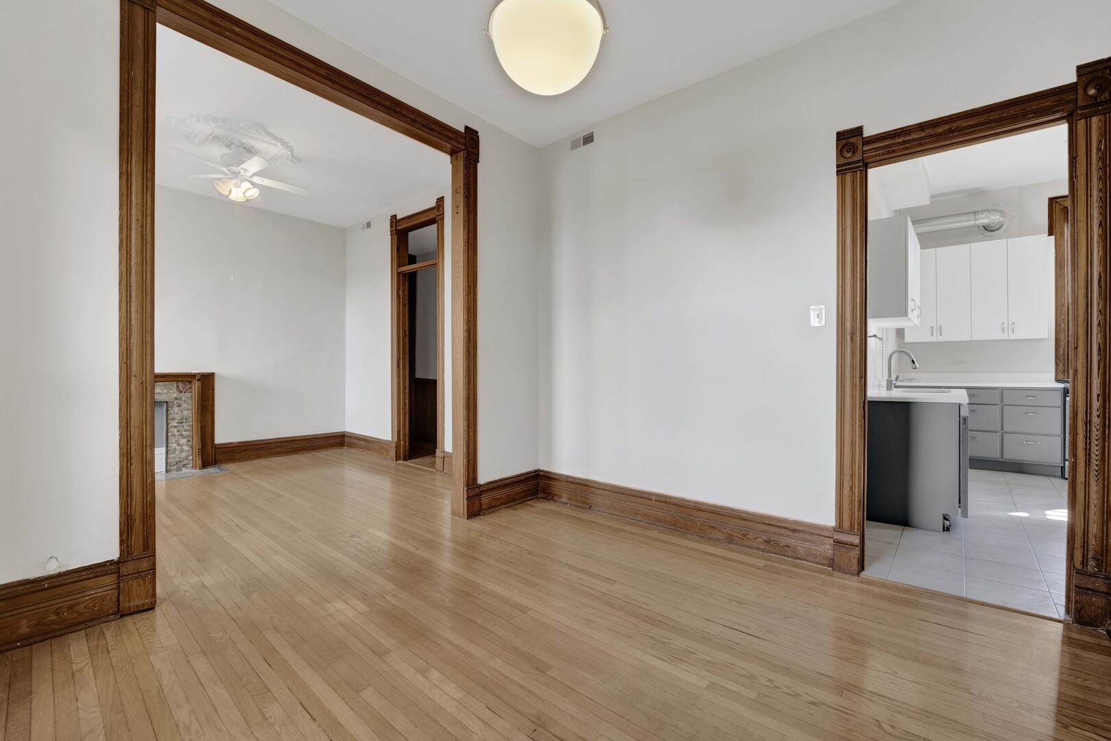 825 West Armitage Avenue, Unit 3S Chicago, IL 60614 - Photo 11 of 18 a view of empty room with wooden floor and fan