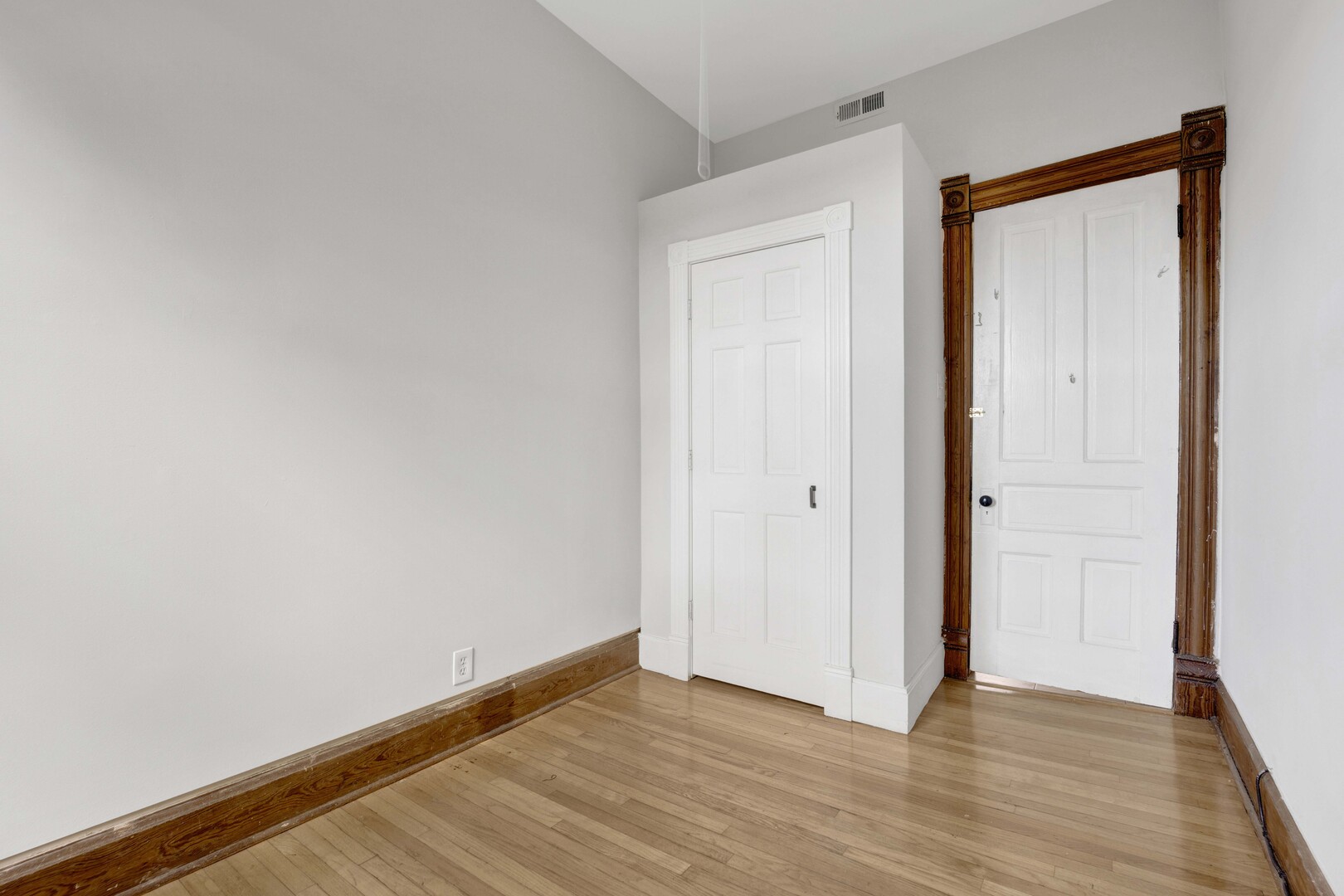 825 West Armitage Avenue, Unit 3S Chicago, IL 60614 - Photo 14 of 18 a view of an empty room with wooden floor and closet