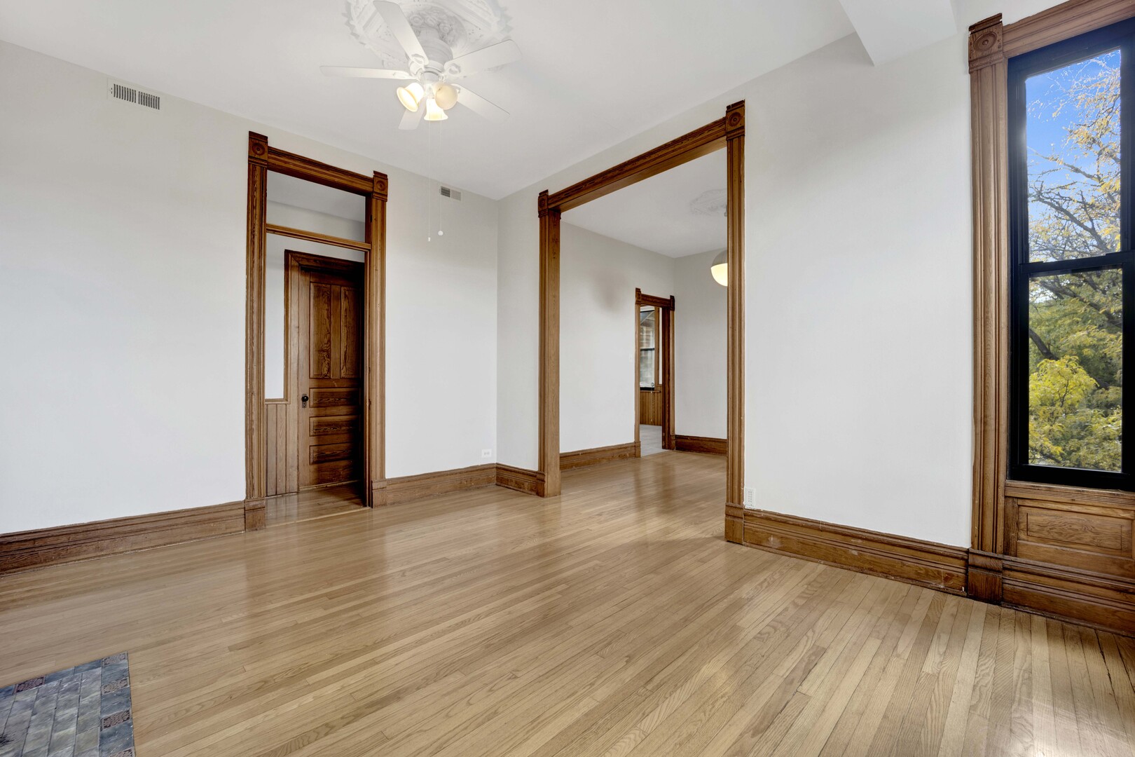 825 West Armitage Avenue, Unit 3S Chicago, IL 60614 - Photo 6 of 18 wooden floor in an empty room with a window