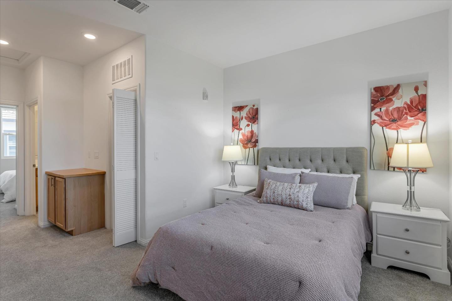 1475 Cherry Circle Milpitas, CA 95035 - Photo 17 of 33 a bedroom with a bed and lamp