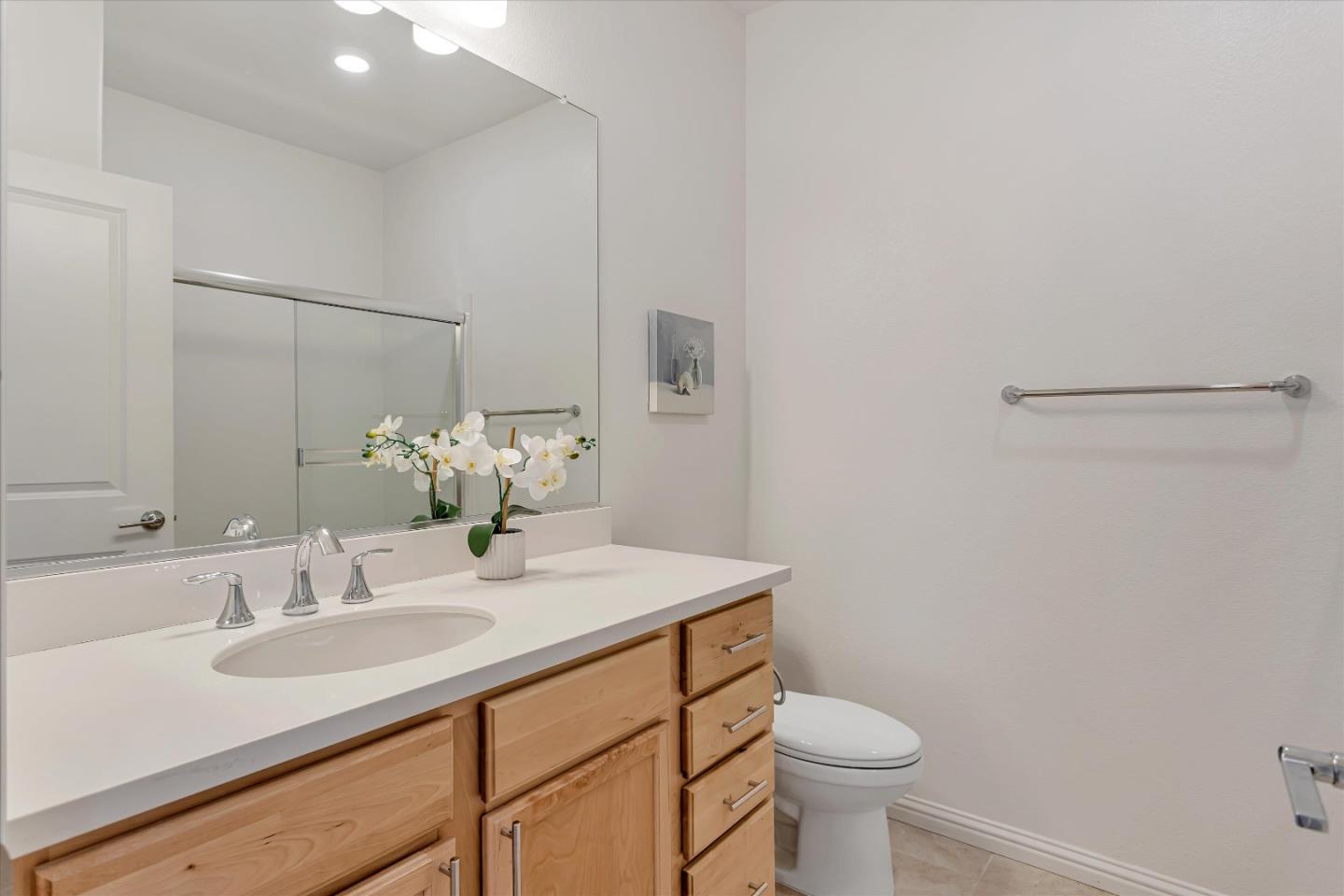 1475 Cherry Circle Milpitas, CA 95035 - Photo 19 of 33 a bathroom with a sink toilet and a mirror