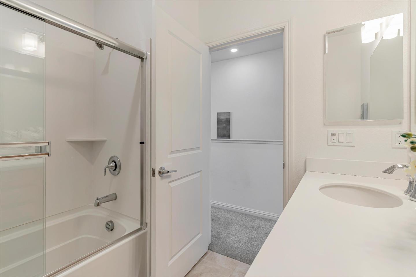 1475 Cherry Circle Milpitas, CA 95035 - Photo 20 of 33 a bathroom with a tub sink and mirror