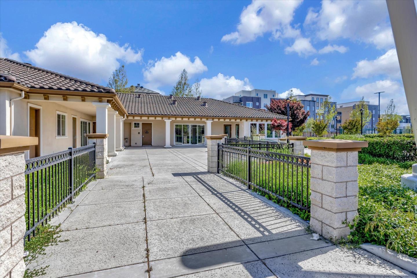 1475 Cherry Circle Milpitas, CA 95035 - Photo 27 of 33 a front view of a house with a garden