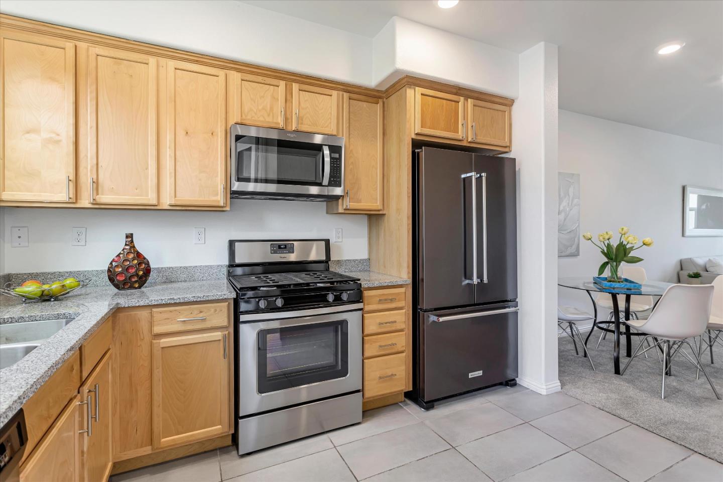 1475 Cherry Circle Milpitas, CA 95035 - Photo 6 of 33 a kitchen with a refrigerator stove and microwave