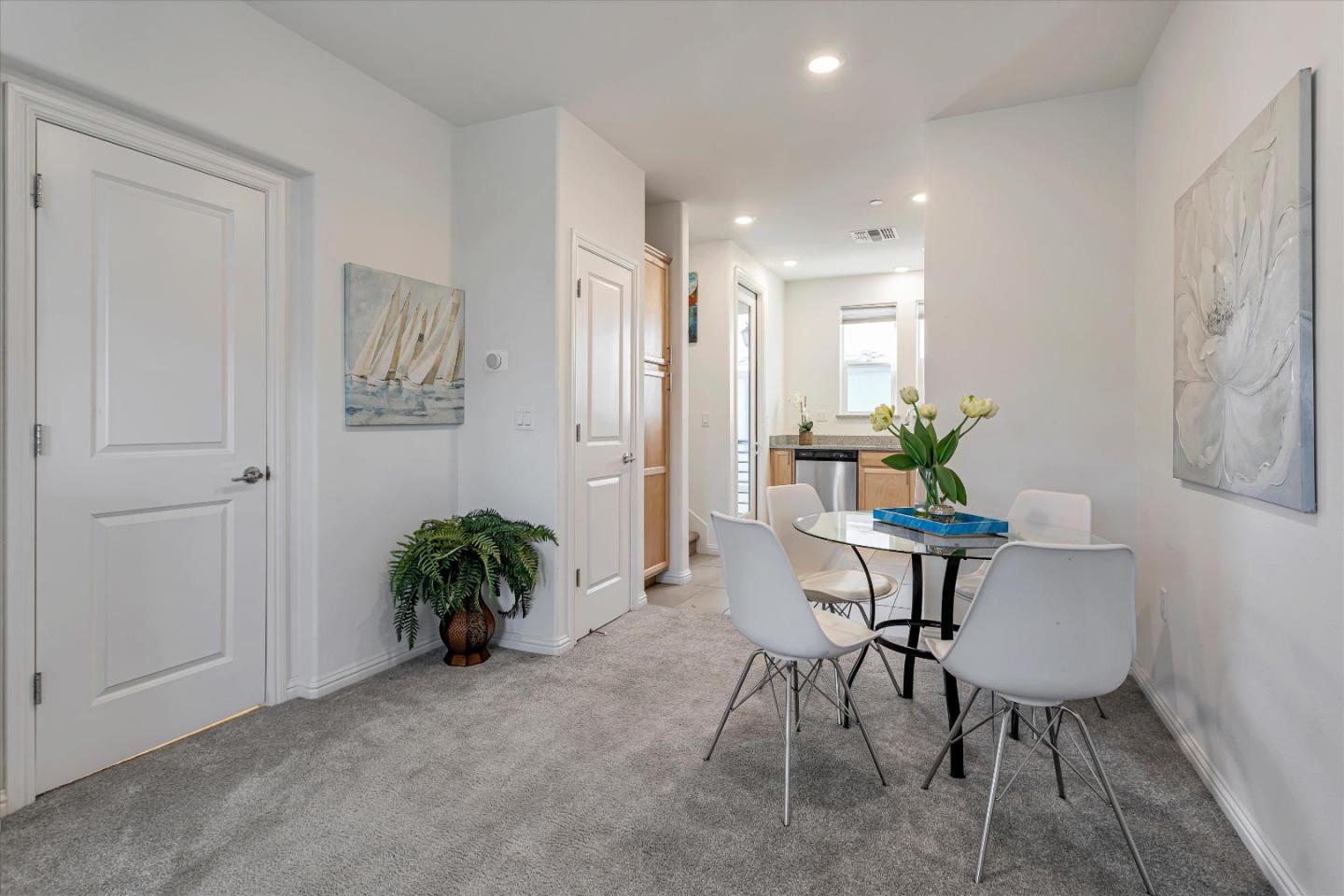 1475 Cherry Circle Milpitas, CA 95035 - Photo 7 of 33 a view of a dining room with furniture and a potted plant