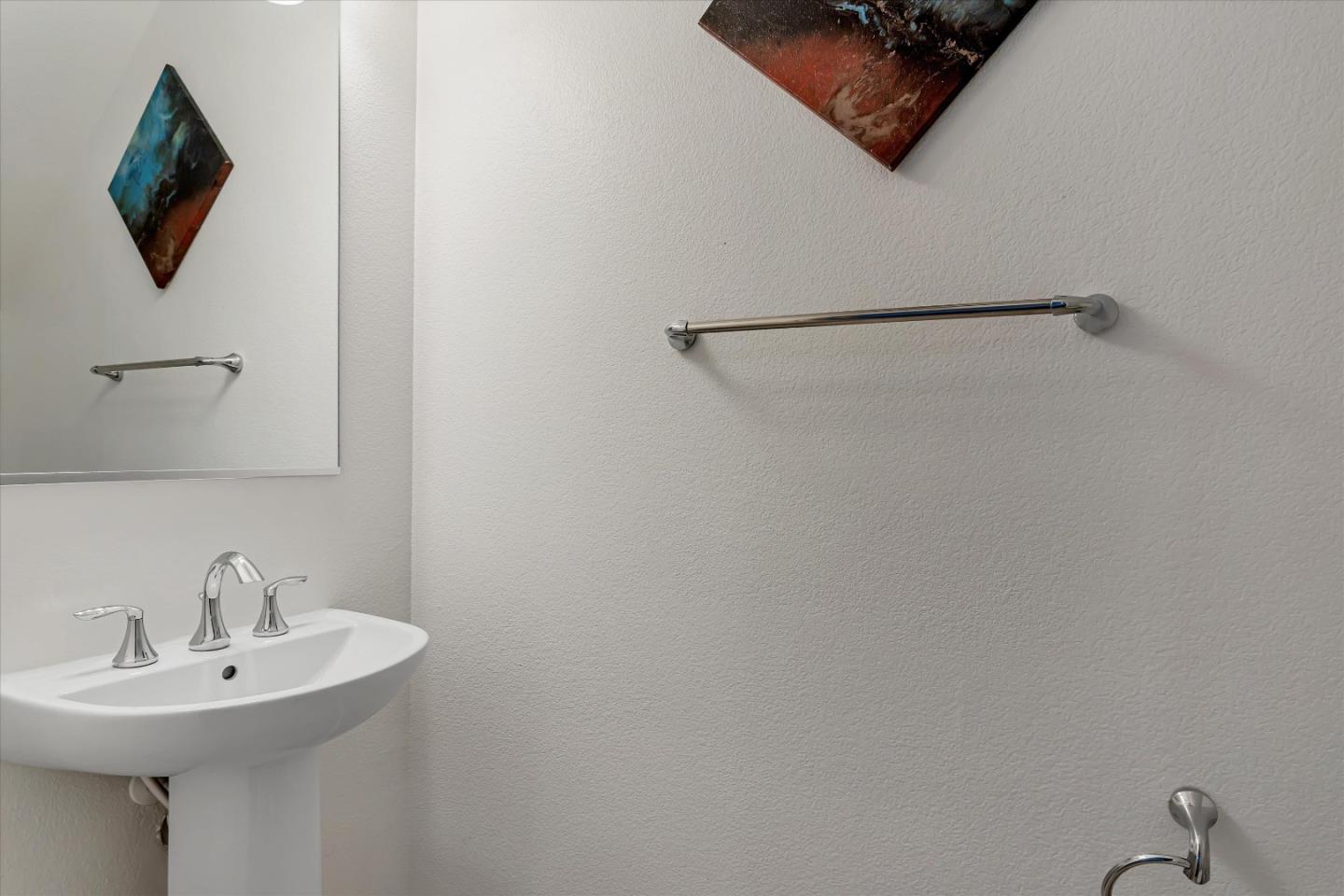 1475 Cherry Circle Milpitas, CA 95035 - Photo 10 of 33 a bathroom with a sink a mirror and vanity