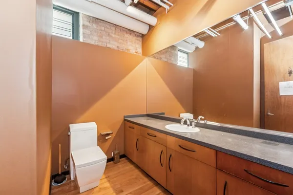 a bathroom with a sink and a toilet
