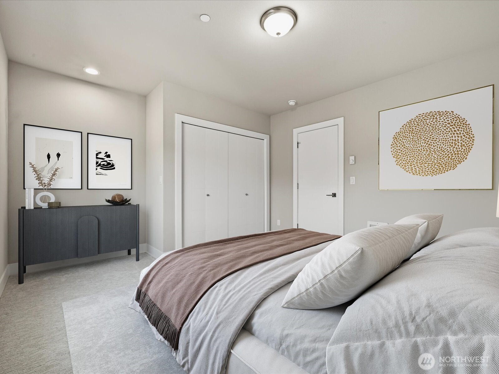 5020 148th Street Southwest, Unit B1 Edmonds, WA 98026 - Photo 19 of 31 a bedroom with a bed and a lamp