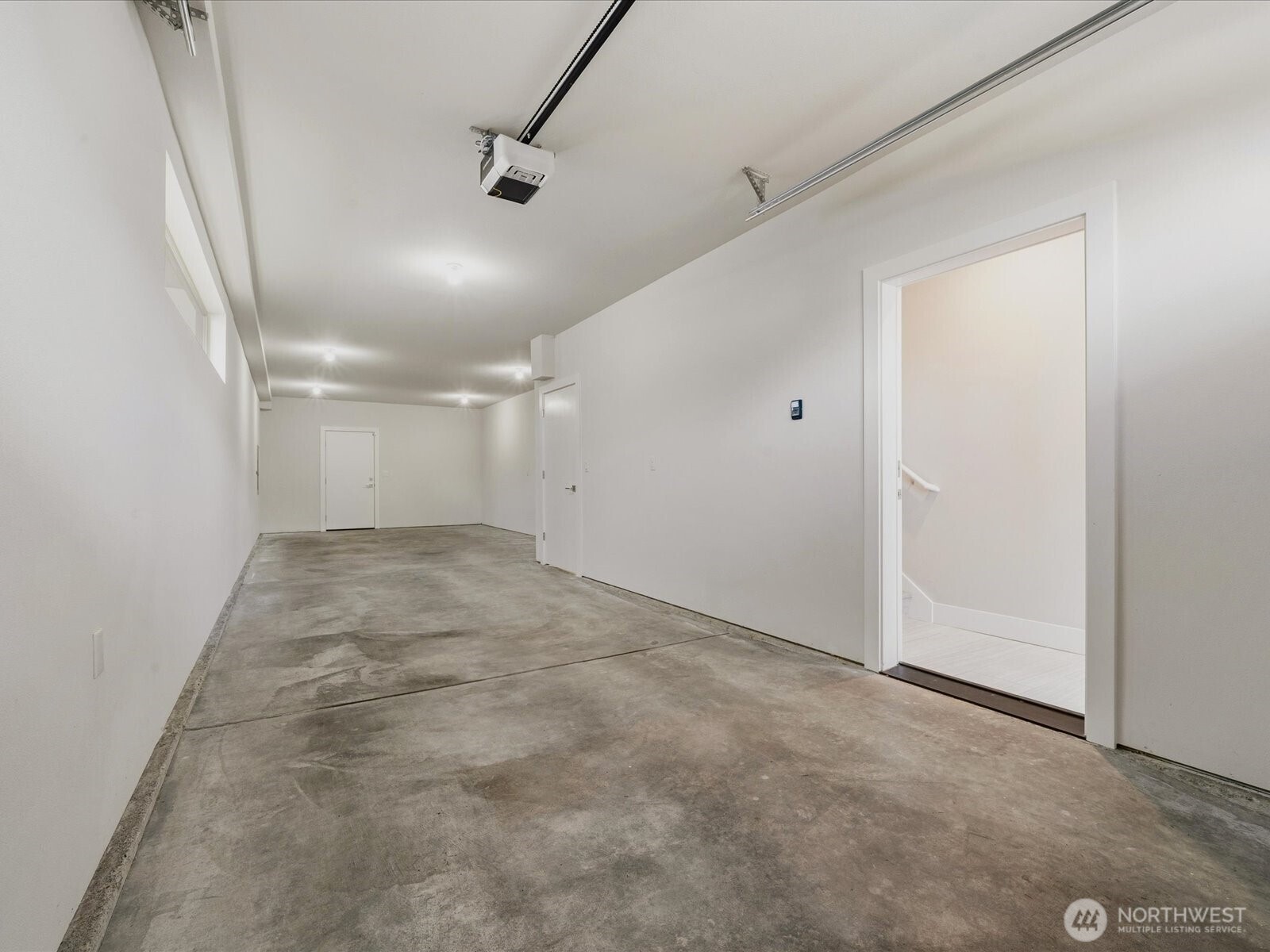 5020 148th Street Southwest, Unit B1 Edmonds, WA 98026 - Photo 22 of 31 an empty room with windows