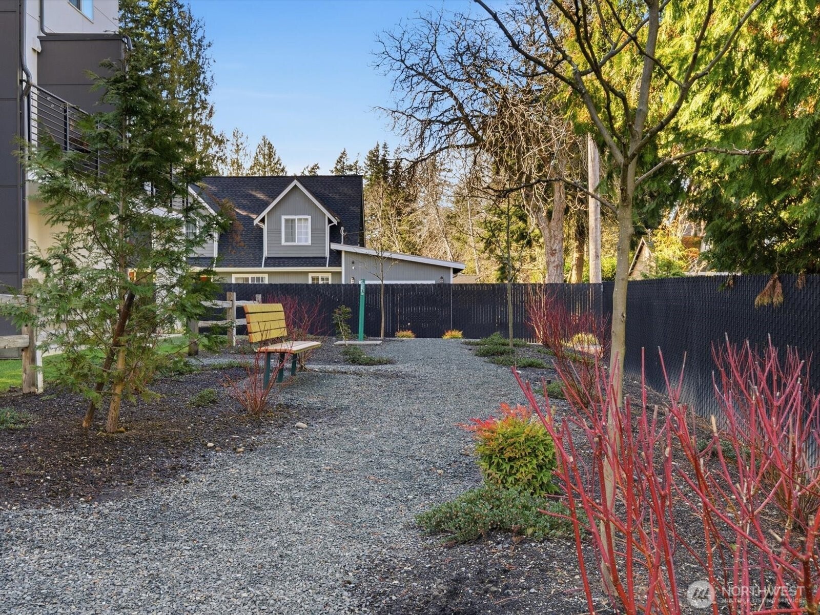 5020 148th Street Southwest, Unit B1 Edmonds, WA 98026 - Photo 25 of 31 a view of a house with a yard and sitting area