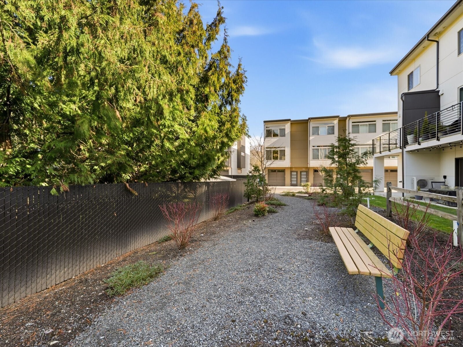 5020 148th Street Southwest, Unit B1 Edmonds, WA 98026 - Photo 26 of 31 a view of a patio with couches plants and large tree