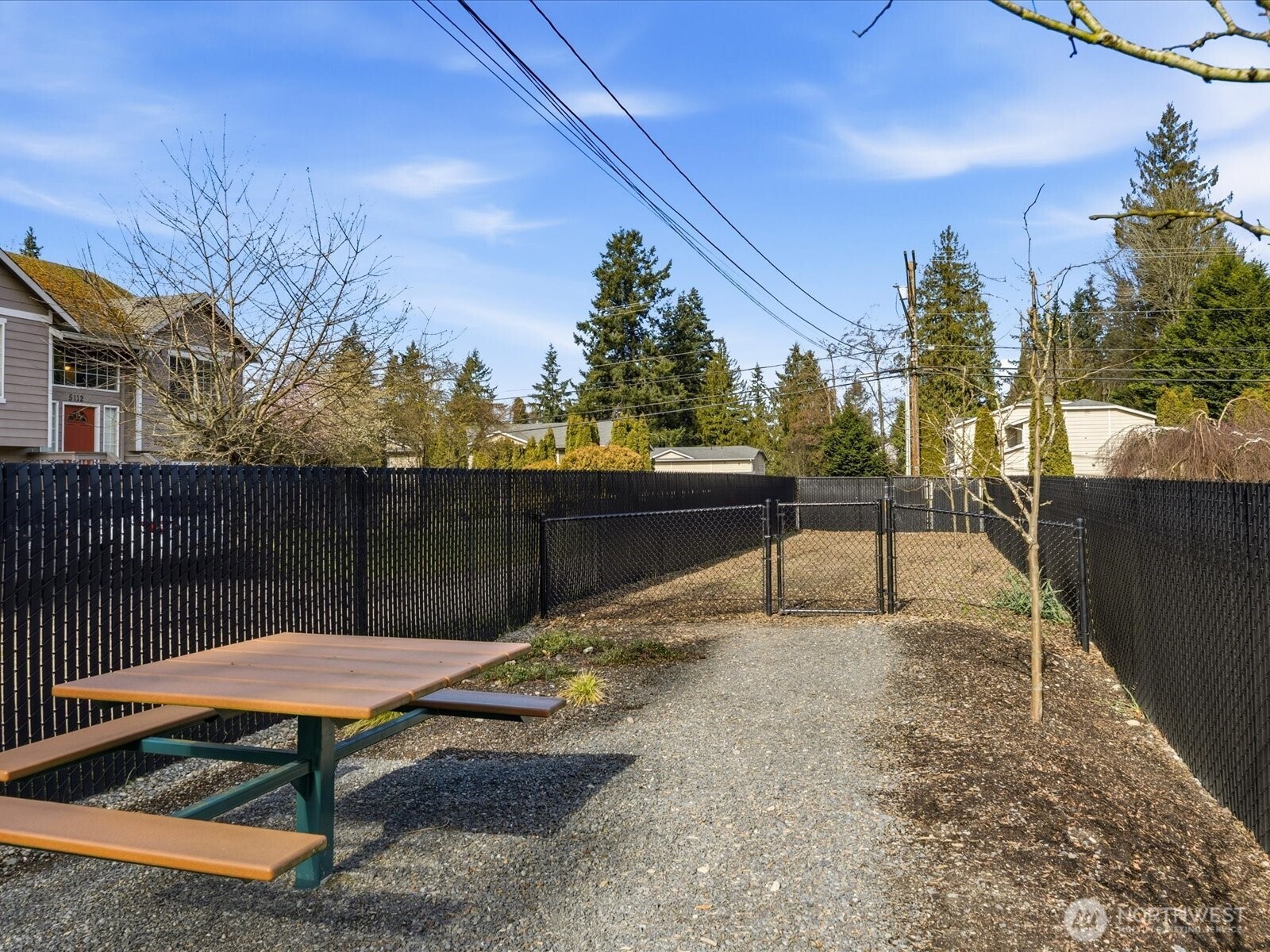 5020 148th Street Southwest, Unit B1 Edmonds, WA 98026 - Photo 27 of 31 a view of a bench in a patio