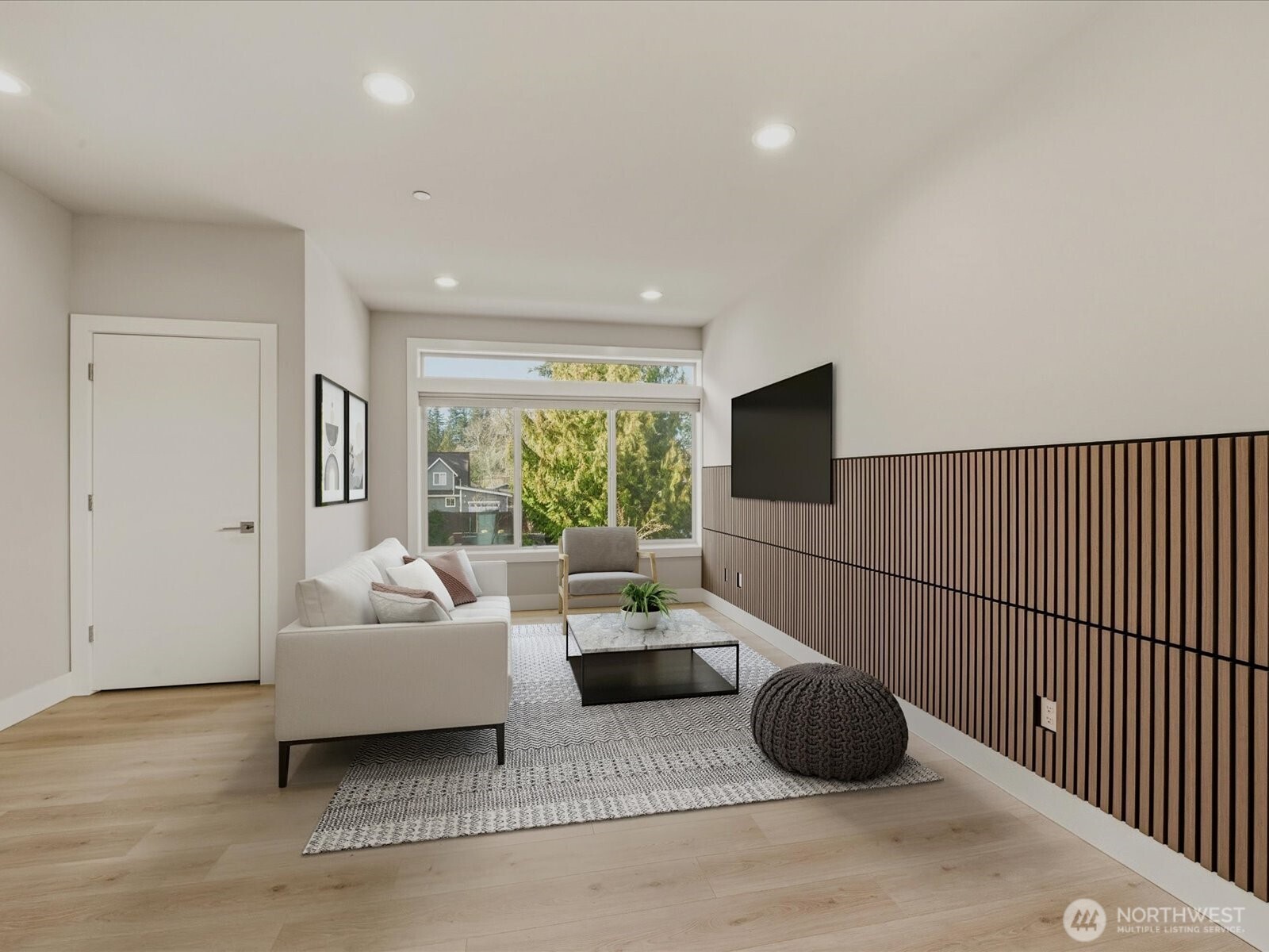 5020 148th Street Southwest, Unit B1 Edmonds, WA 98026 - Photo 9 of 31 a living room with furniture a flat screen tv and a large window