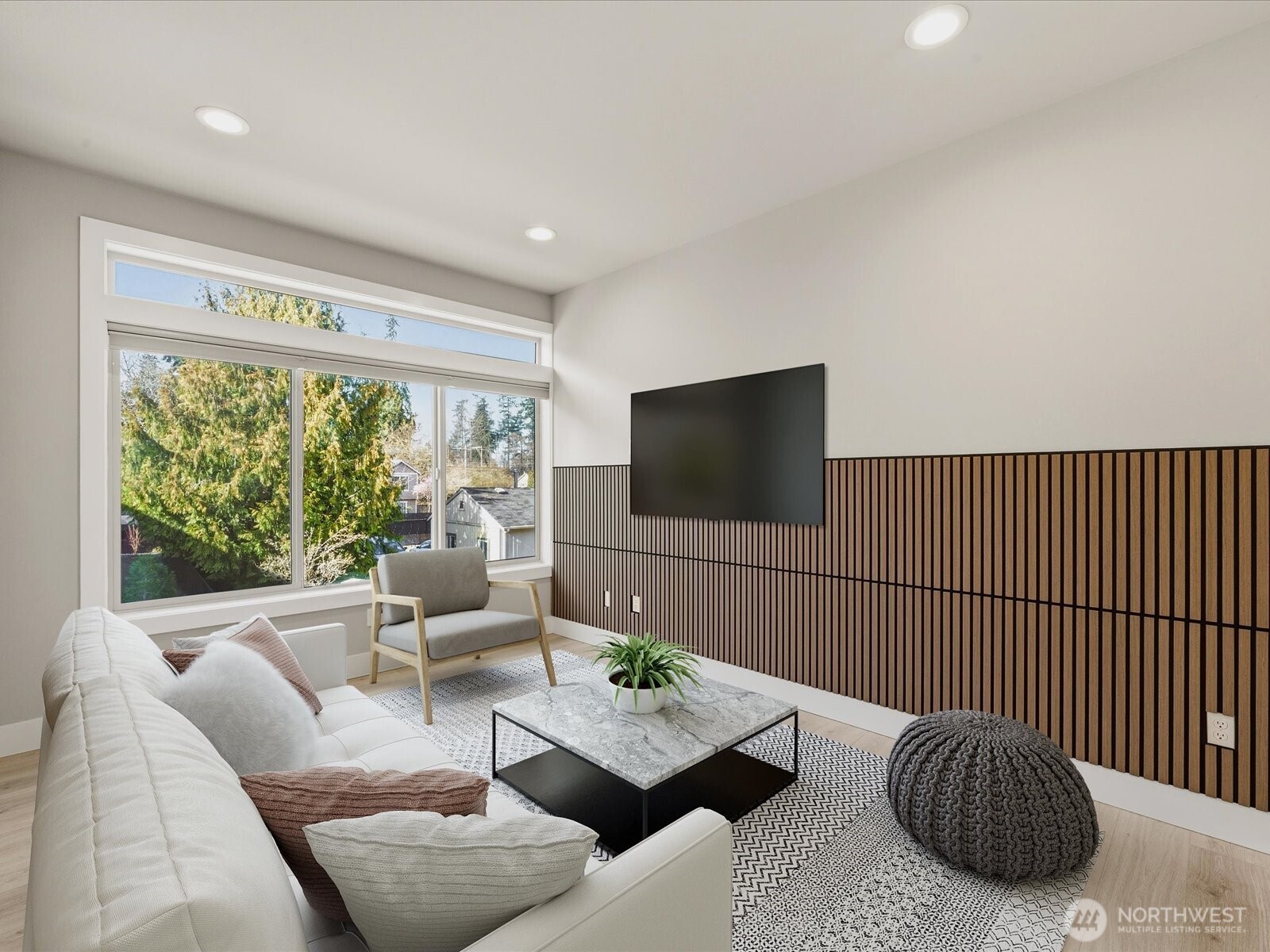 5020 148th Street Southwest, Unit B1 Edmonds, WA 98026 - Photo 10 of 31 a living room with furniture and a flat screen tv