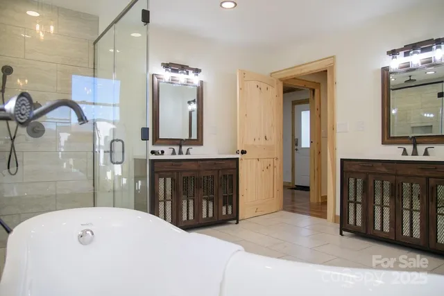 a bathroom with a sink a vanity and a mirror