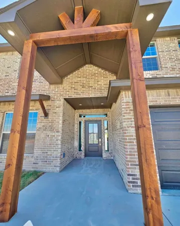 a view of cabinets and wooden floor