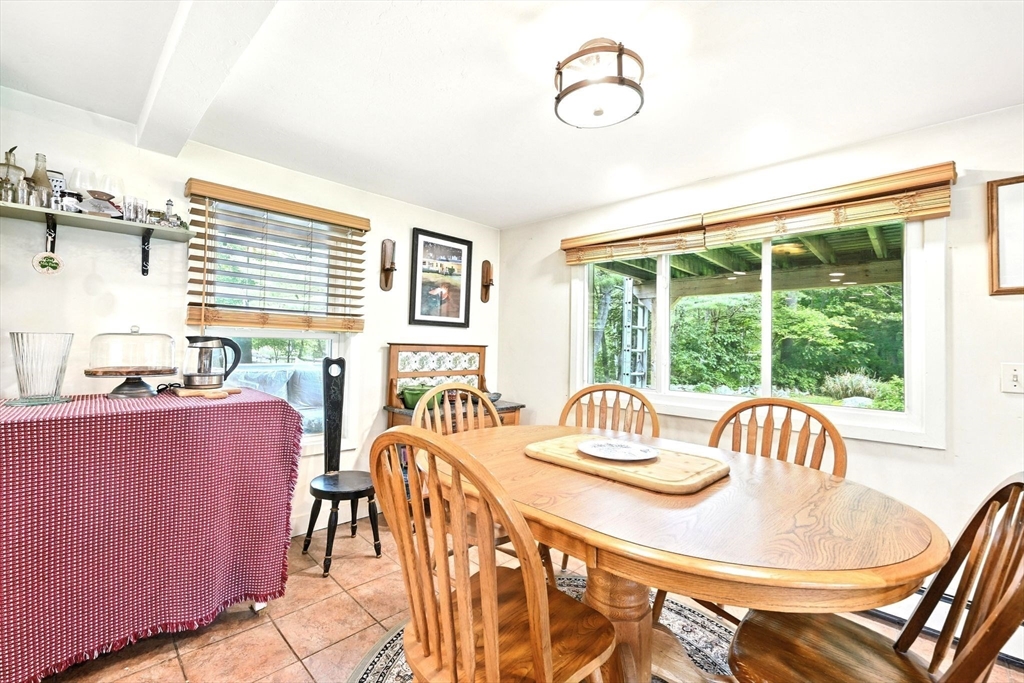 23 Westboro Road Upton, MA 01568 - Photo 14 of 42 a dining room with furniture and windows