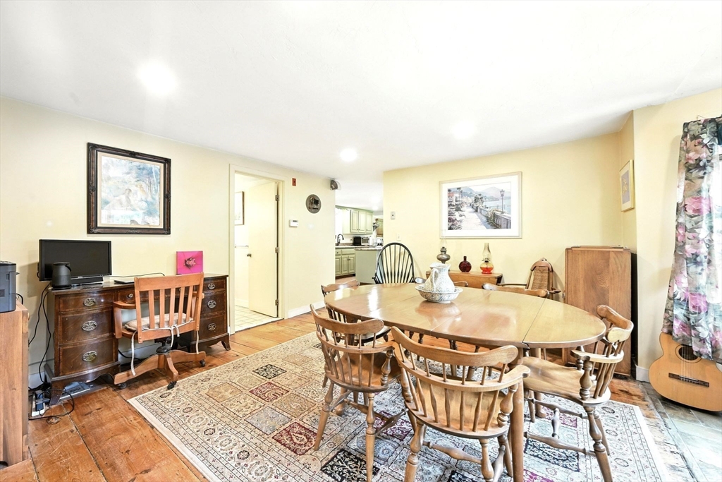 23 Westboro Road Upton, MA 01568 - Photo 15 of 42 a dining room with furniture and wooden floor