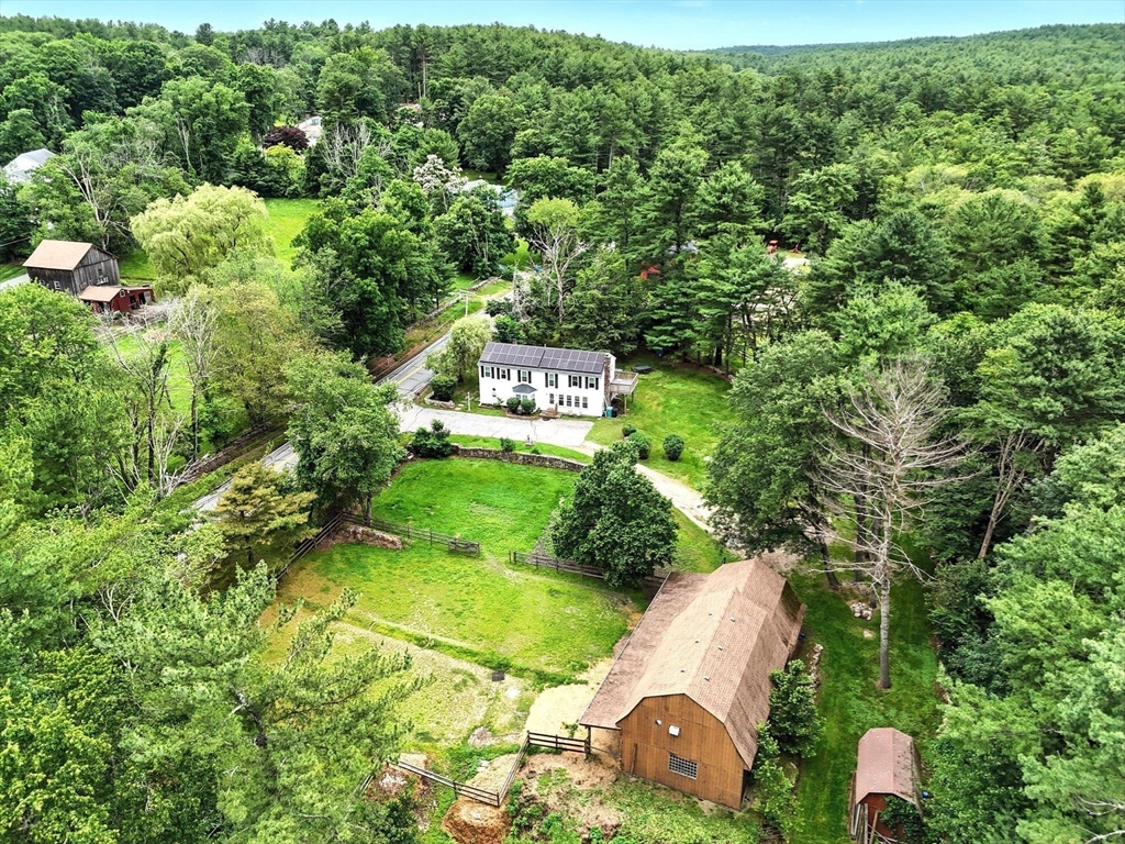 23 Westboro Road Upton, MA 01568 - Photo 2 of 42 a aerial view of a house with yard