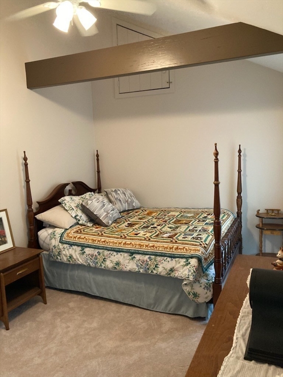 23 Westboro Road Upton, MA 01568 - Photo 25 of 42 a bed sitting in a bedroom next to a window