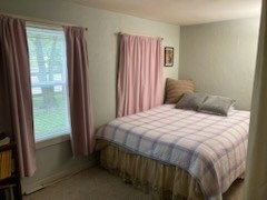 23 Westboro Road Upton, MA 01568 - Photo 26 of 42 a bedroom with a bed and a window