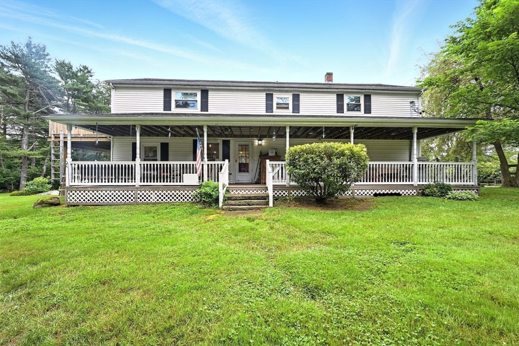 23 Westboro Road Upton, MA 01568 - Photo 3 of 42 front view of a house with a yard