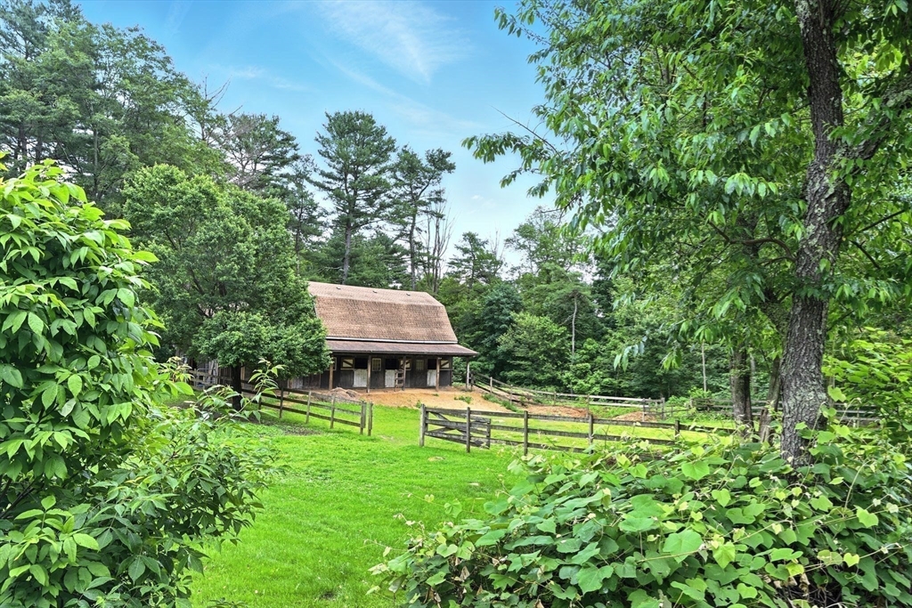 23 Westboro Road Upton, MA 01568 - Photo 39 of 42 a backyard of a house with swimming pool and green space