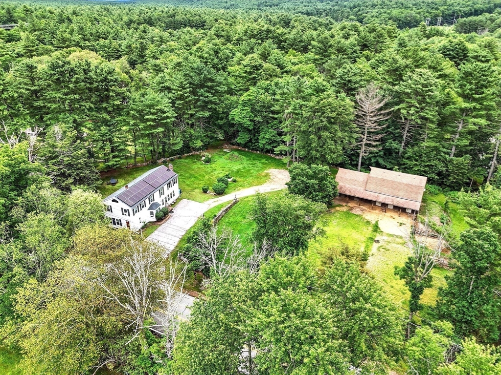23 Westboro Road Upton, MA 01568 - Photo 40 of 42 an aerial view of a house with a yard