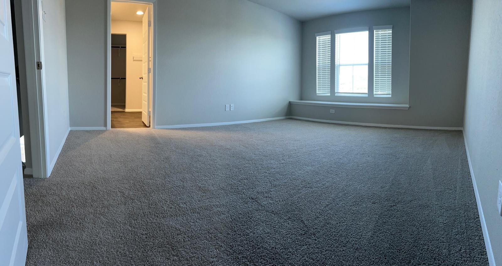 11516 Murano Drive Austin, TX 78747 - Photo 9 of 23 an empty room that has a window