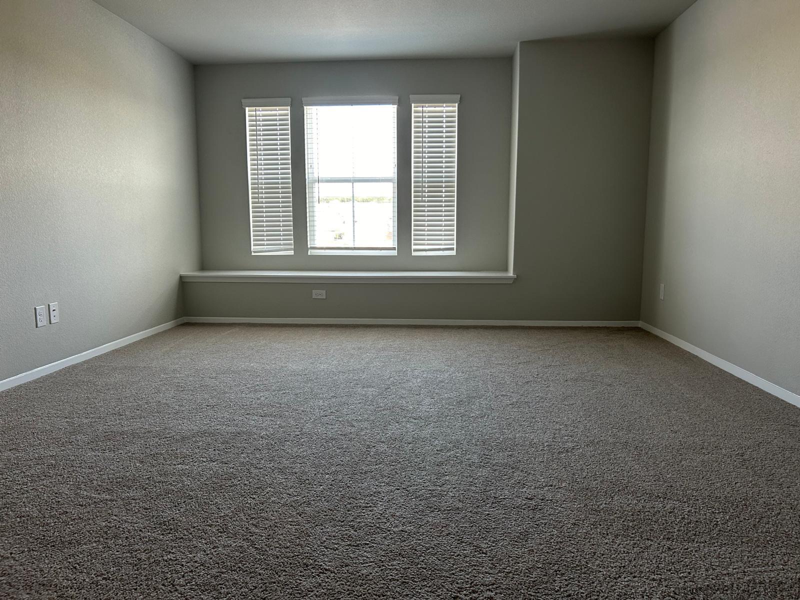 11516 Murano Drive Austin, TX 78747 - Photo 14 of 23 an empty room with a window