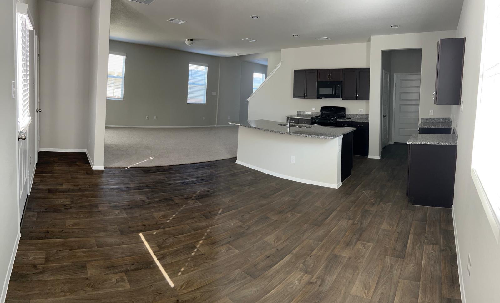 11516 Murano Drive Austin, TX 78747 - Photo 23 of 23 a view of kitchen with microwave and cabinets