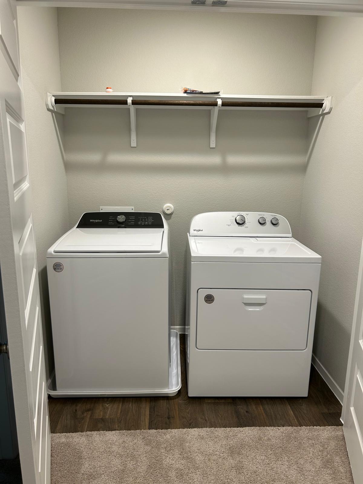 11516 Murano Drive Austin, TX 78747 - Photo 8 of 23 a utility room with dryer and washer