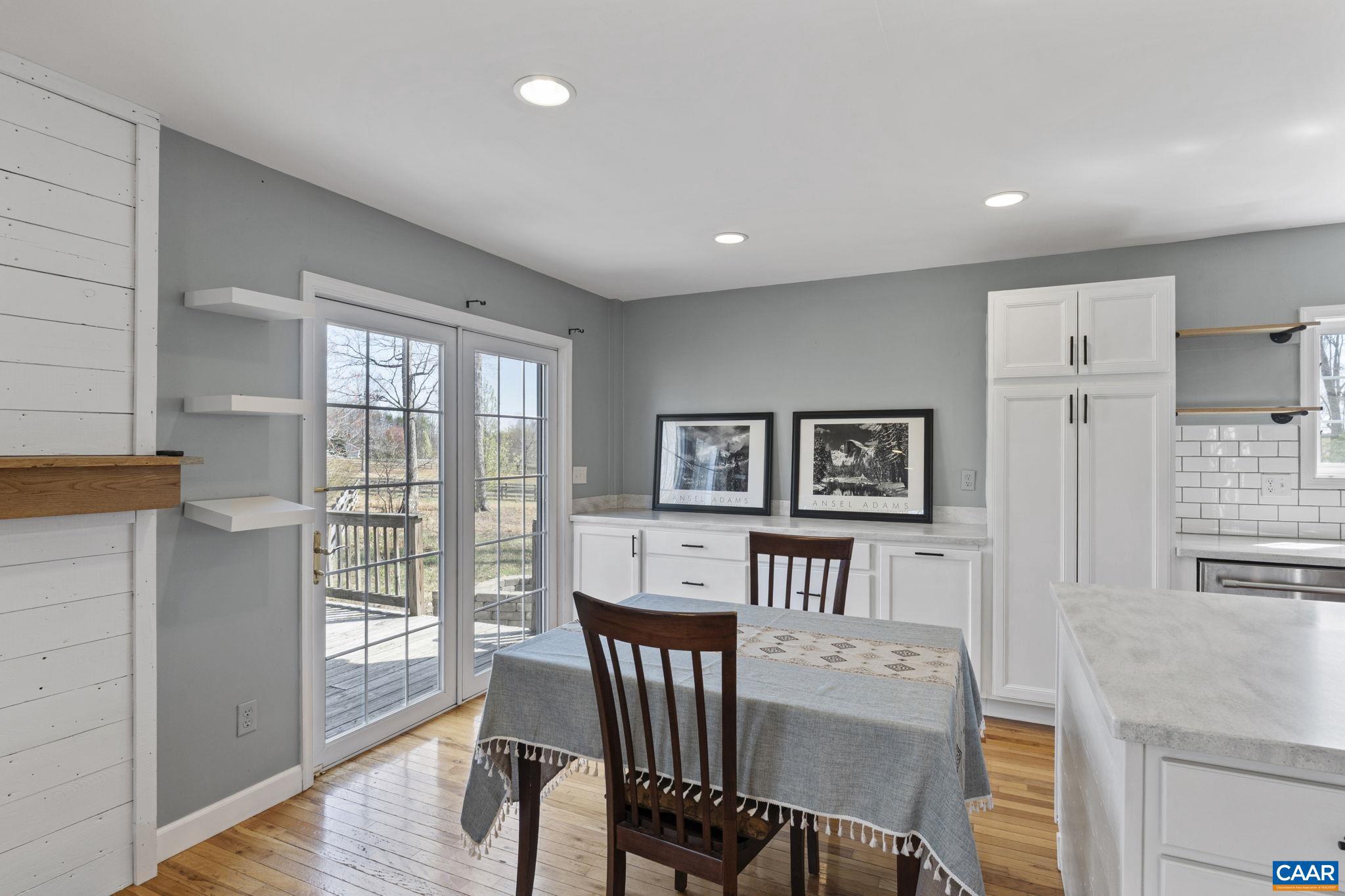 379 Fox Ridge Lane Palmyra, VA 22963 - Photo 12 of 42 a view of a dining room with furniture window and wooden floor