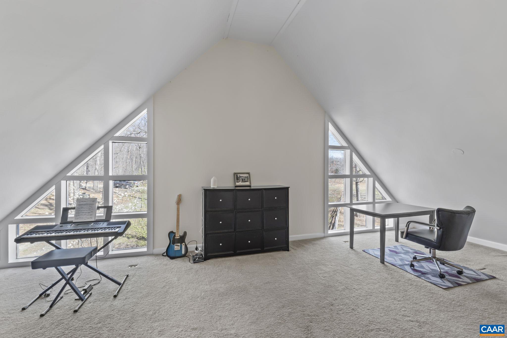 379 Fox Ridge Lane Palmyra, VA 22963 - Photo 21 of 42 a view of a workspace with furniture and a window