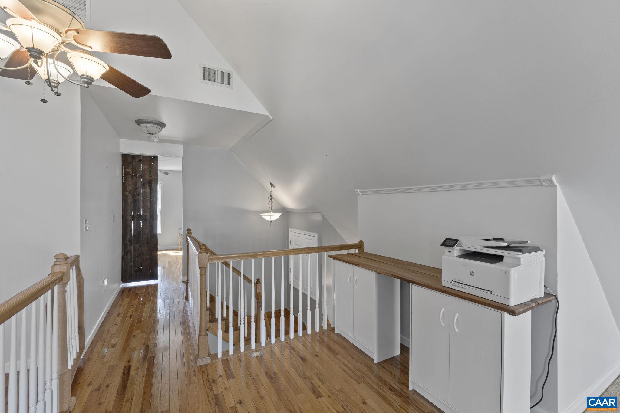 379 Fox Ridge Lane Palmyra, VA 22963 - Photo 22 of 42 a view of a hallway with a hardwood floor