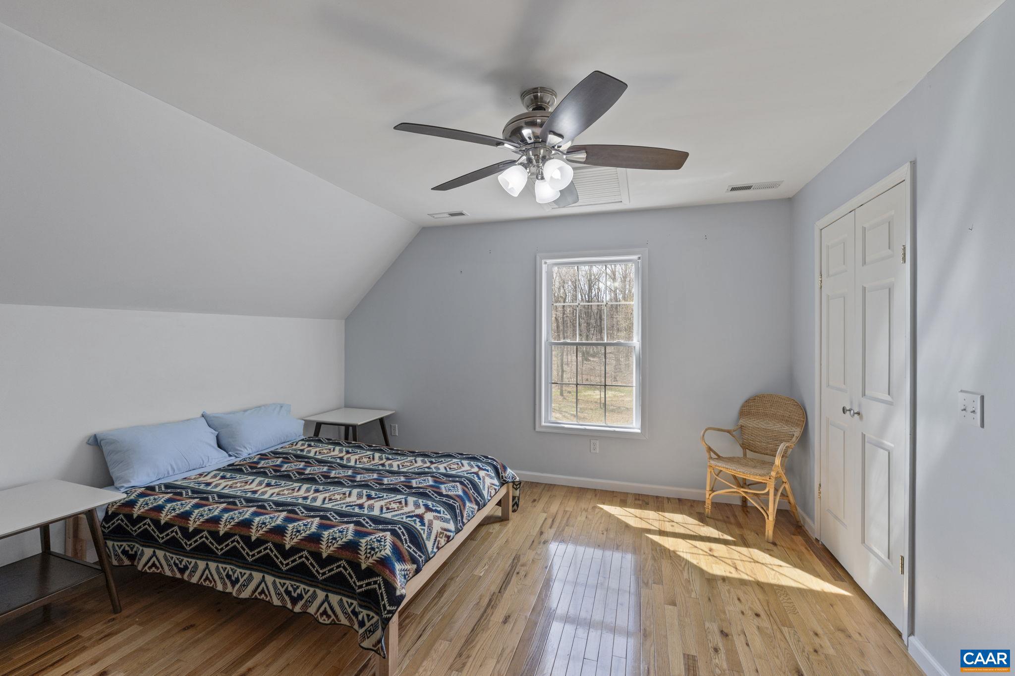 379 Fox Ridge Lane Palmyra, VA 22963 - Photo 25 of 42 a bedroom with a bed and a window