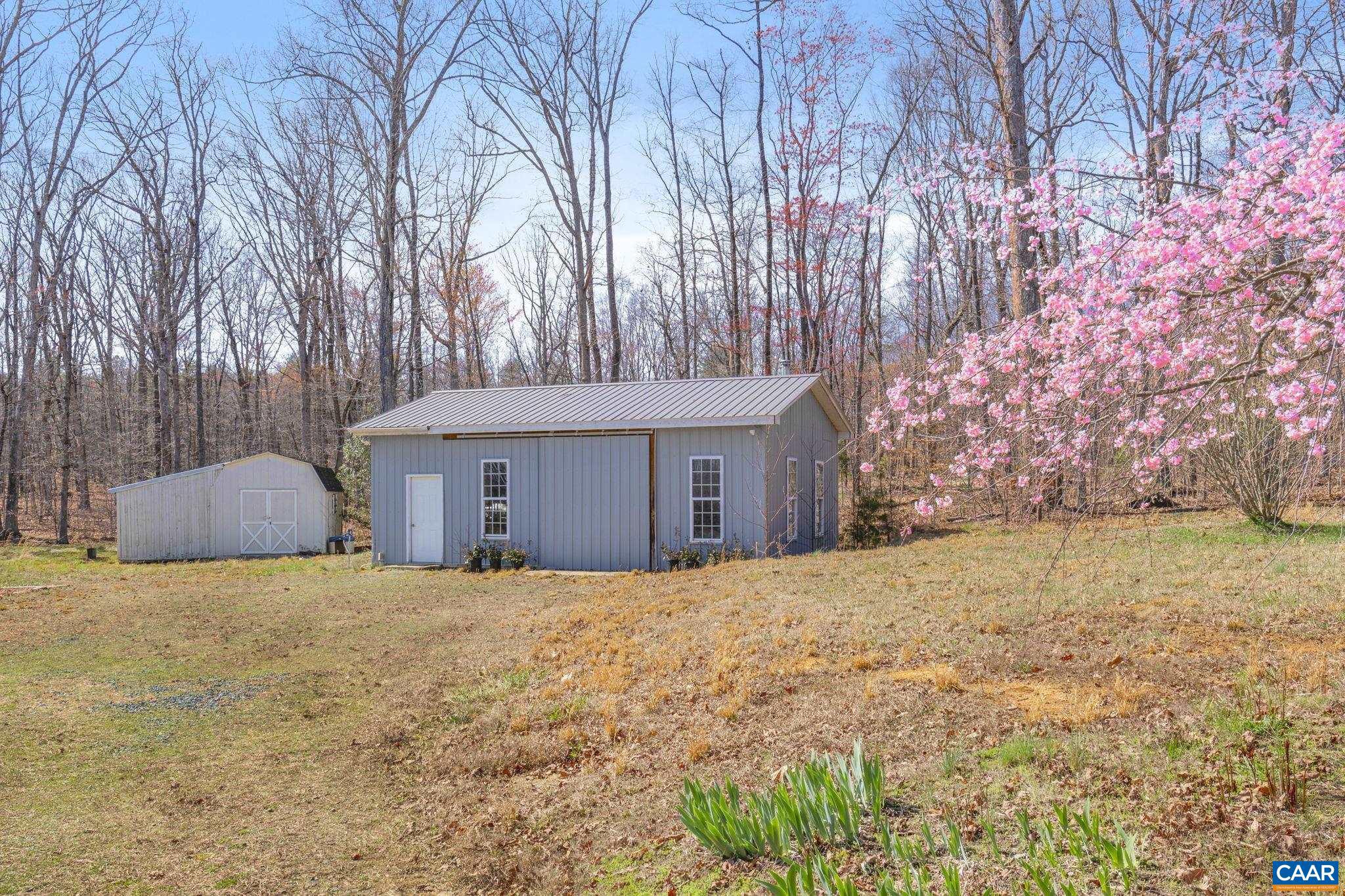379 Fox Ridge Lane Palmyra, VA 22963 - Photo 39 of 42 a house with trees in front of it
