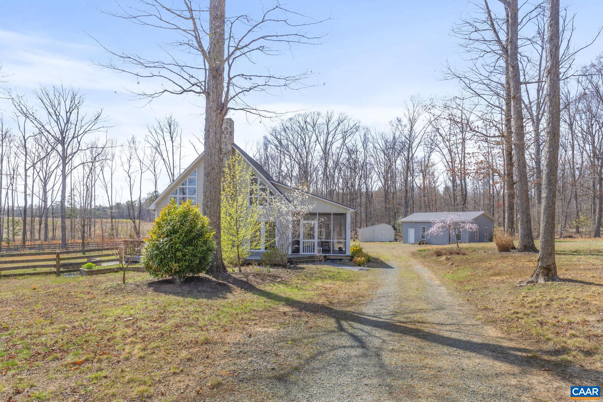 379 Fox Ridge Lane Palmyra, VA 22963 - Photo 5 of 42 a view of a house with a yard covered in snow