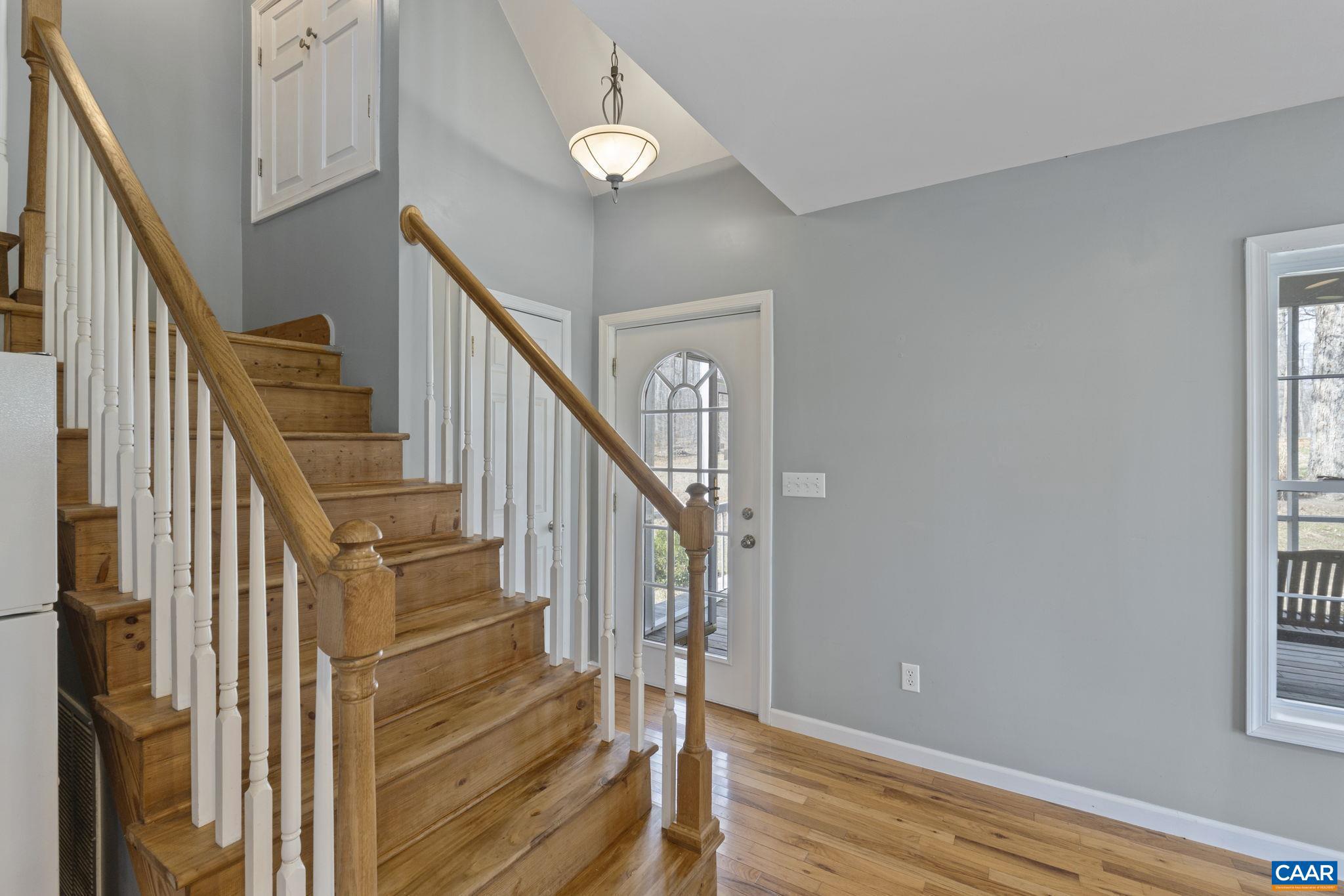 379 Fox Ridge Lane Palmyra, VA 22963 - Photo 6 of 42 a view of staircase with wooden floor and white walls