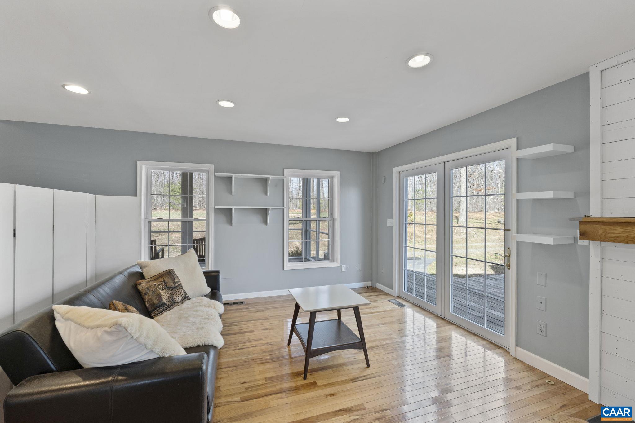 379 Fox Ridge Lane Palmyra, VA 22963 - Photo 7 of 42 a living room with furniture and wooden floor