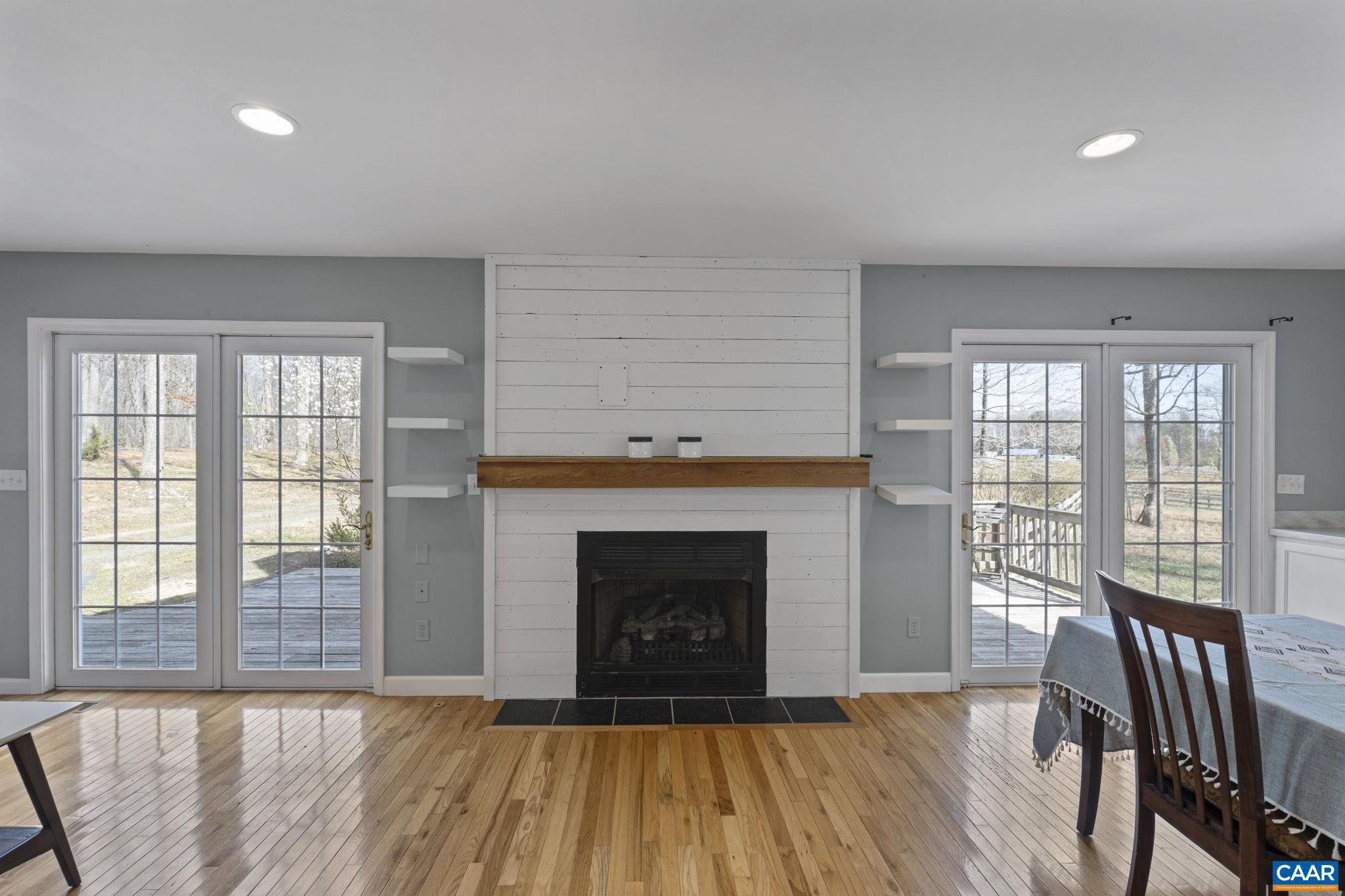 379 Fox Ridge Lane Palmyra, VA 22963 - Photo 10 of 42 a view of a livingroom with furniture and a fireplace