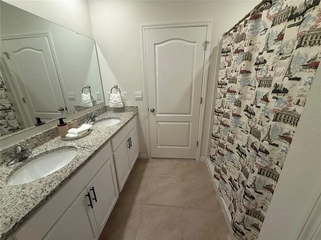 a white toilet sitting next to a window