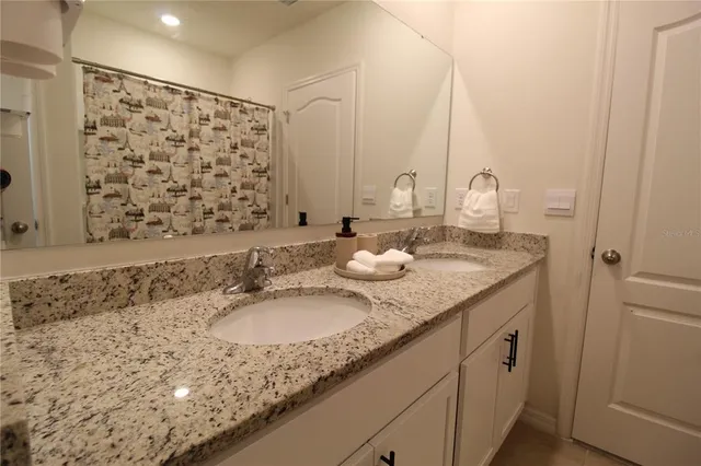 a view of a balcony with a white door