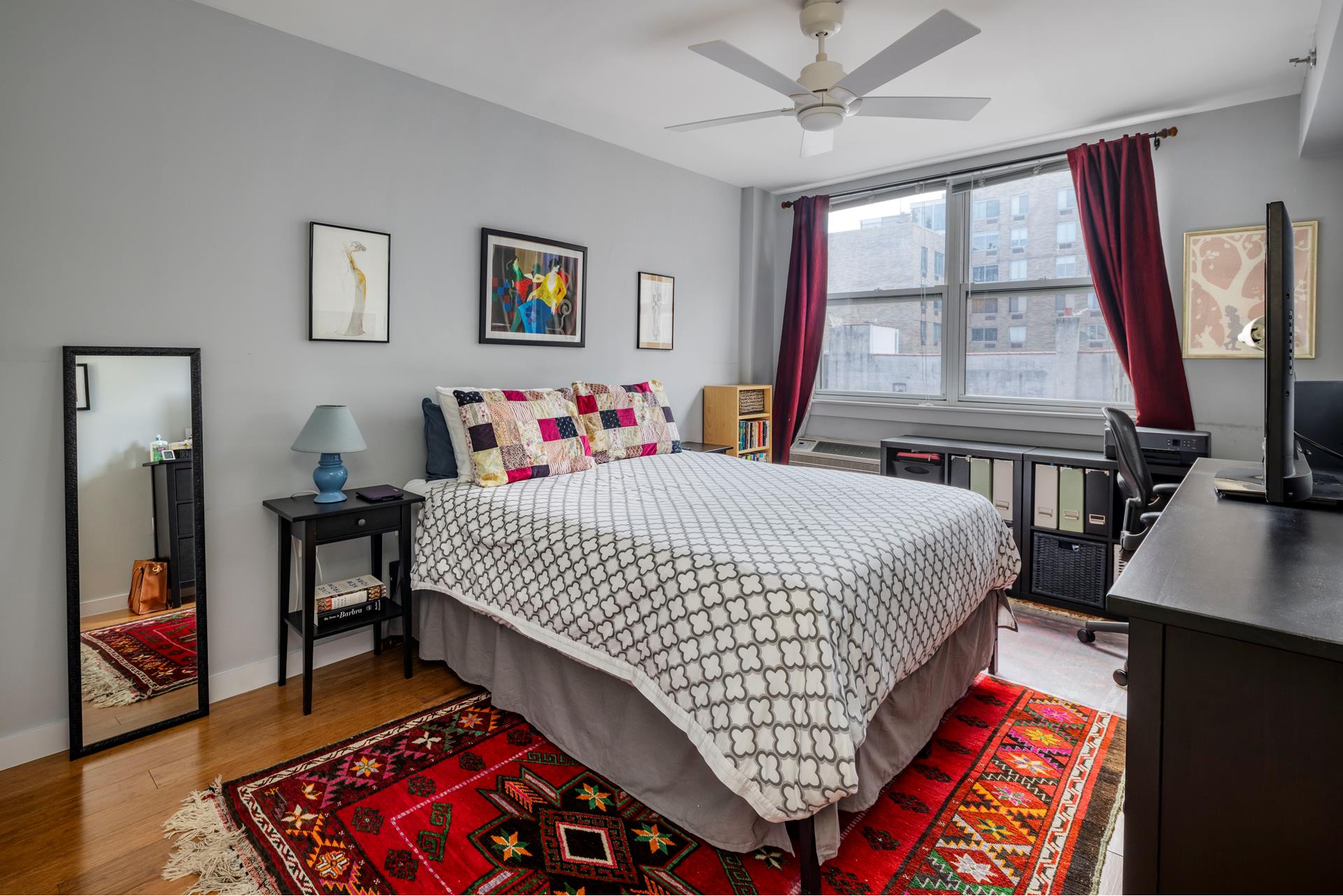 303 West 146th Street, Unit 7F Manhattan, NY 10039 - Photo 6 of 7 a bedroom with furniture and a window